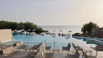 Indoor pool, open 10:00 AM to 6:00 PM, pool umbrellas, sun loungers