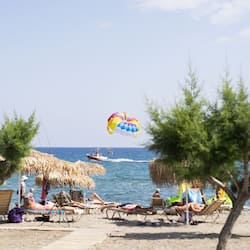 On the beach, sun loungers, beach umbrellas