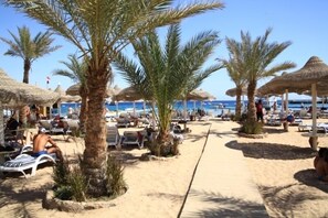 Private beach, sun loungers, beach umbrellas, beach towels