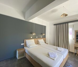 Double Twin Room | 1 dormitorio, caja fuerte, espacio para trabajar con un portátil