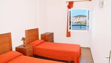 1 dormitori i roba de llit