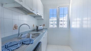Superior Apartment, 1 Bedroom | Private kitchen | Full-size fridge, microwave, stovetop, coffee/tea maker