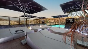Seasonal outdoor pool, open 11:00 AM to 8:00 PM, pool umbrellas - Block (Munxar)