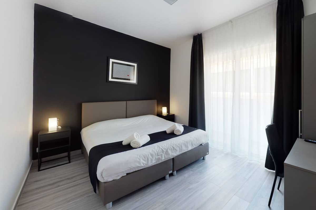 Minibar, iron/ironing board (on request), bed sheets