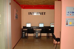 A computer lab with two workstations, a server, and a wall-mounted sign that reads "INTERNET". - Amaris (Sunny Beach)