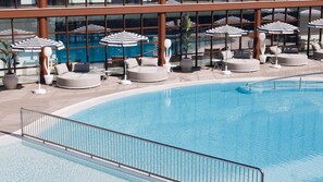 Indoor pool, seasonal outdoor pool, pool umbrellas, pool loungers