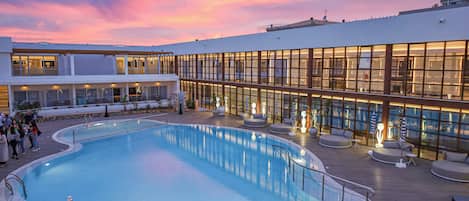 Indoor pool, seasonal outdoor pool, pool umbrellas, sun loungers