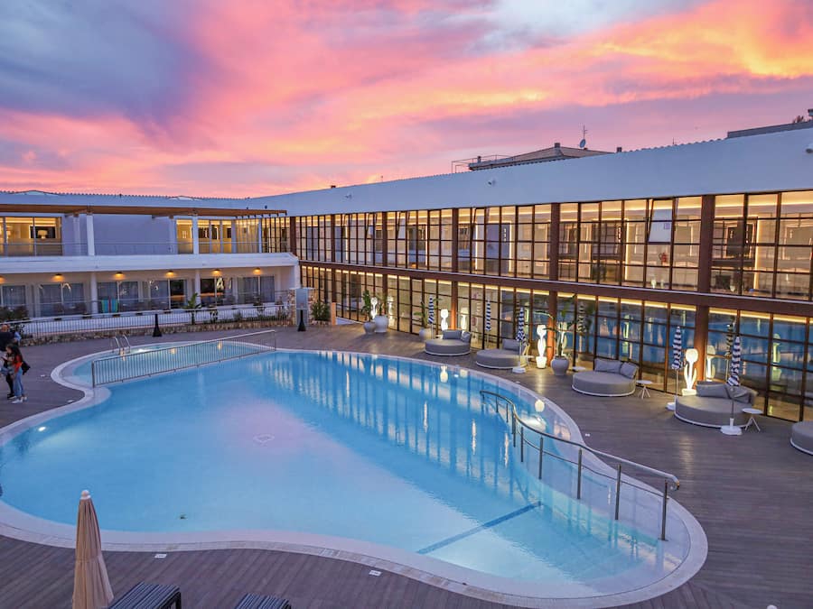 Indoor pool, seasonal outdoor pool, pool umbrellas, pool loungers
