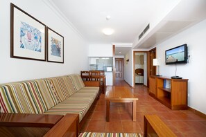 32-inch flat-screen TV with satellite channels, TV