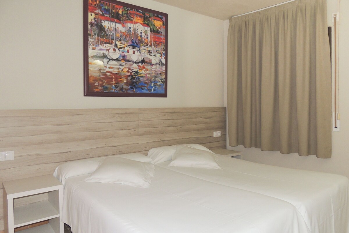 1 bedroom, blackout drapes, bed sheets