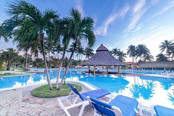 2 outdoor pools, pool umbrellas, pool loungers