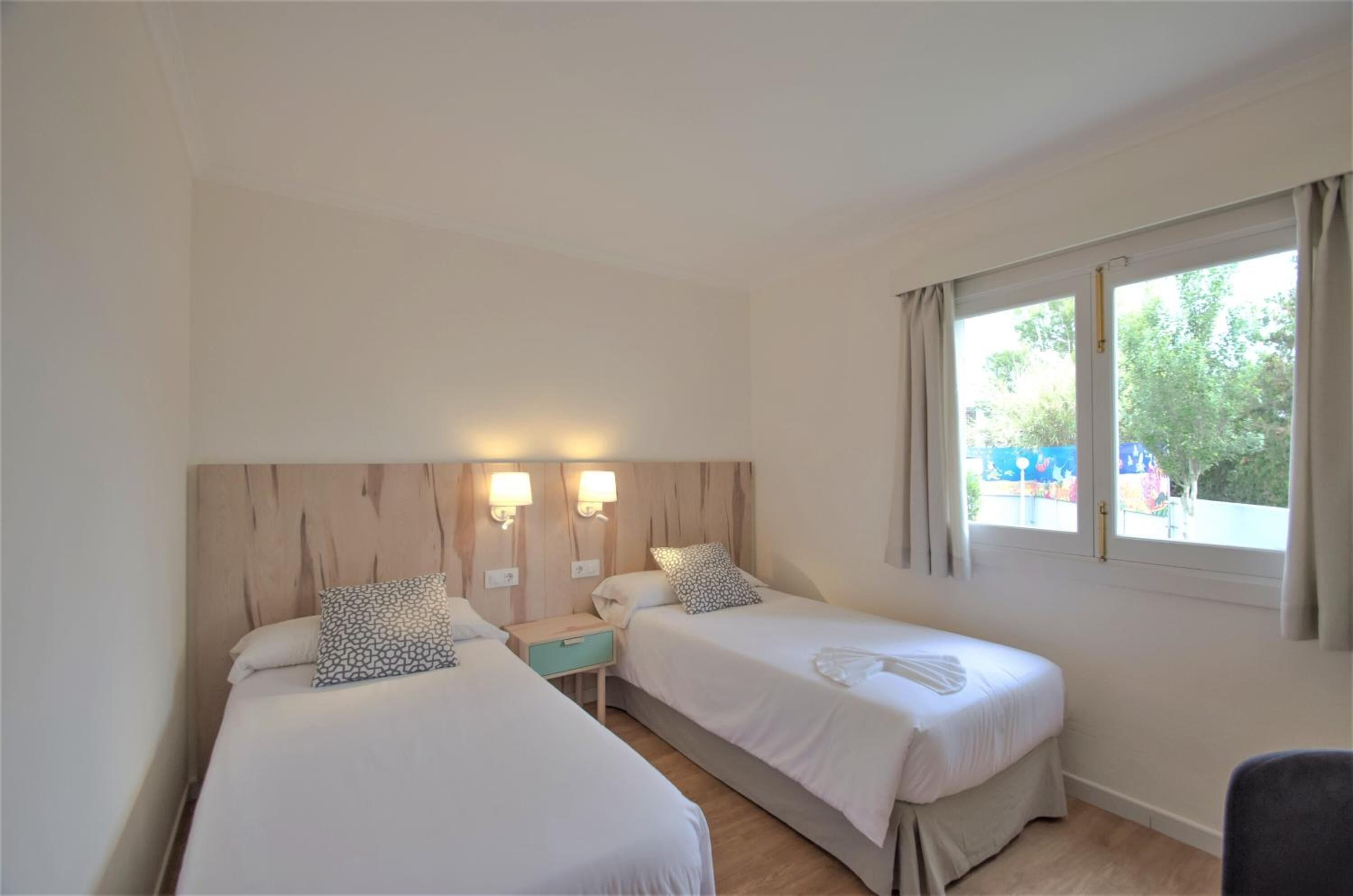 apartment, 1 bedroom, balcony | 1 bedroom, down duvets, desk, blackout curtains