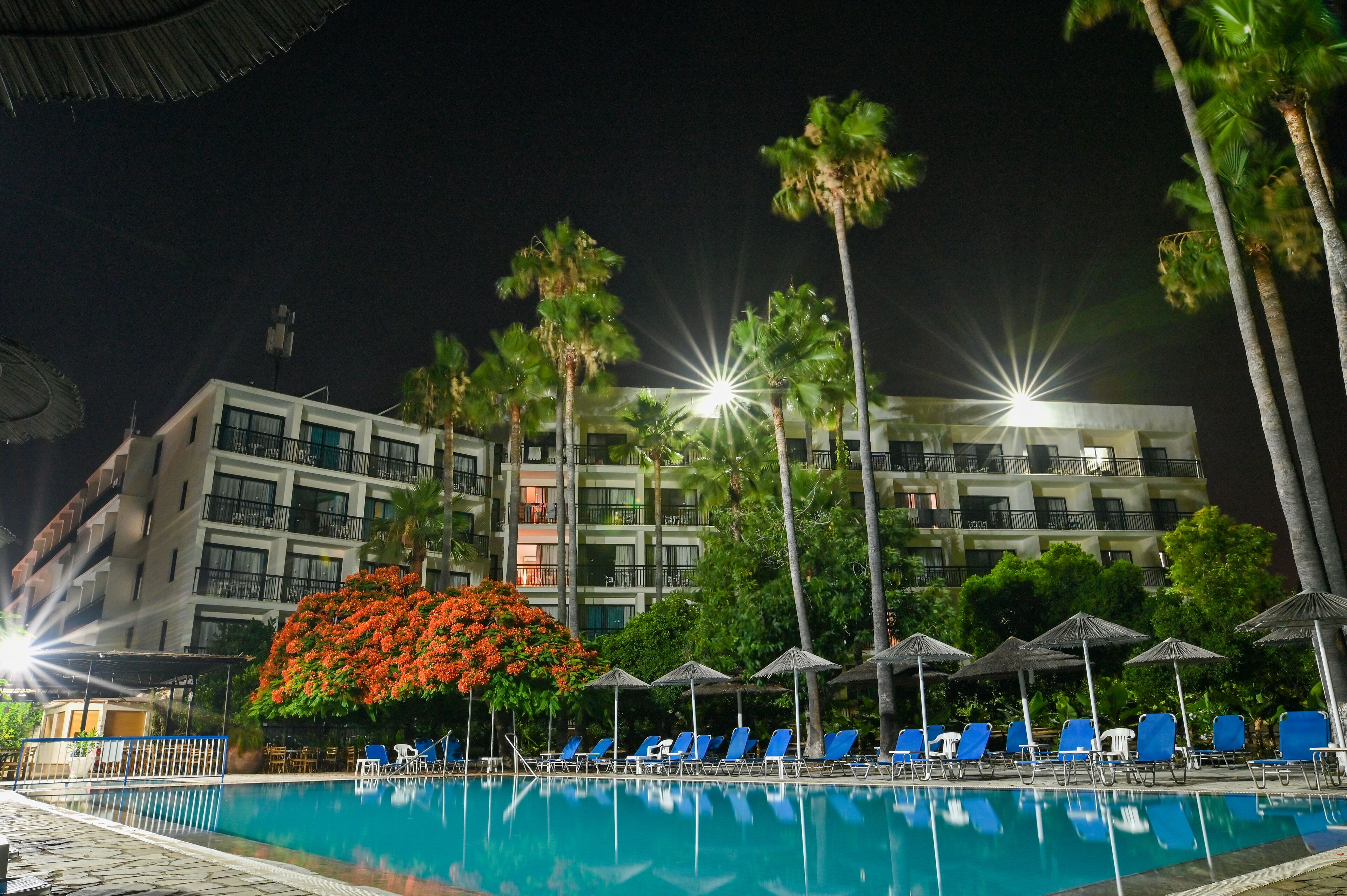 outdoor pool, pool umbrellas, pool loungers