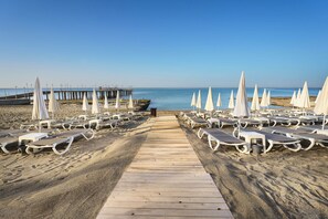 Private beach, sun loungers, beach umbrellas, beach towels