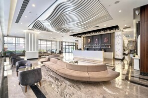 3 bars/lounges, 3 poolside bars, beach bar