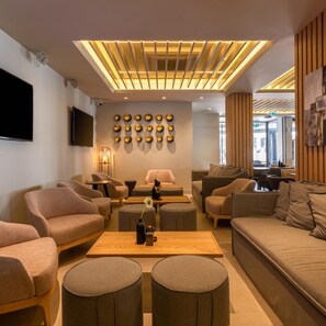 A modern living room with sofas, a coffee table, and a TV. - Liquid (Ayia Napa)