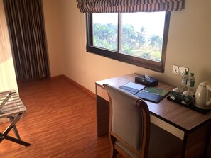 Luxury Room, 1 King Bed, Private Bathroom, River View | Minibar, in-room safe, desk, laptop workspace - Uptown Hotel (Yangon)
