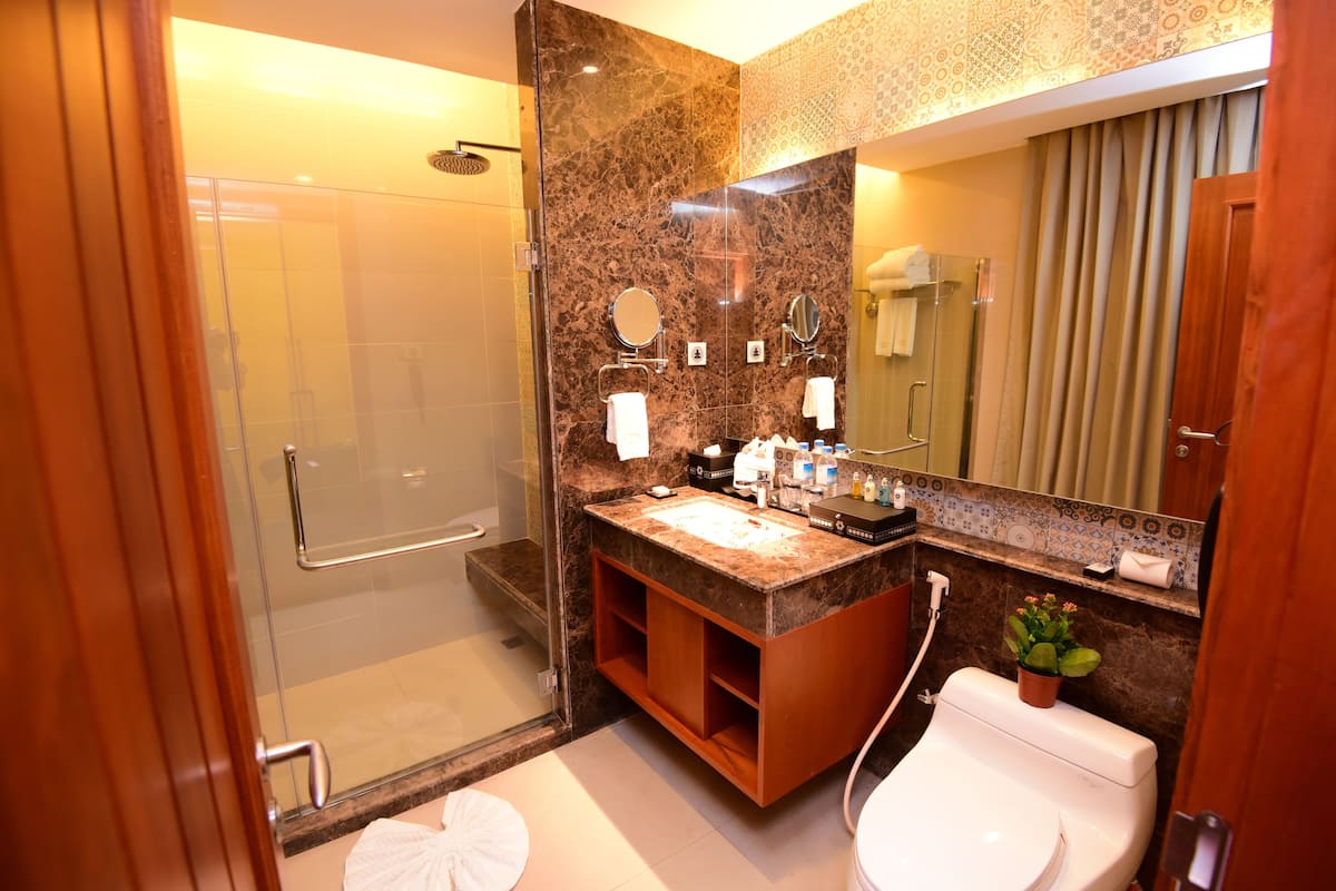 grand deluxe | bathroom | shower, free toiletries, hair dryer, bathrobes