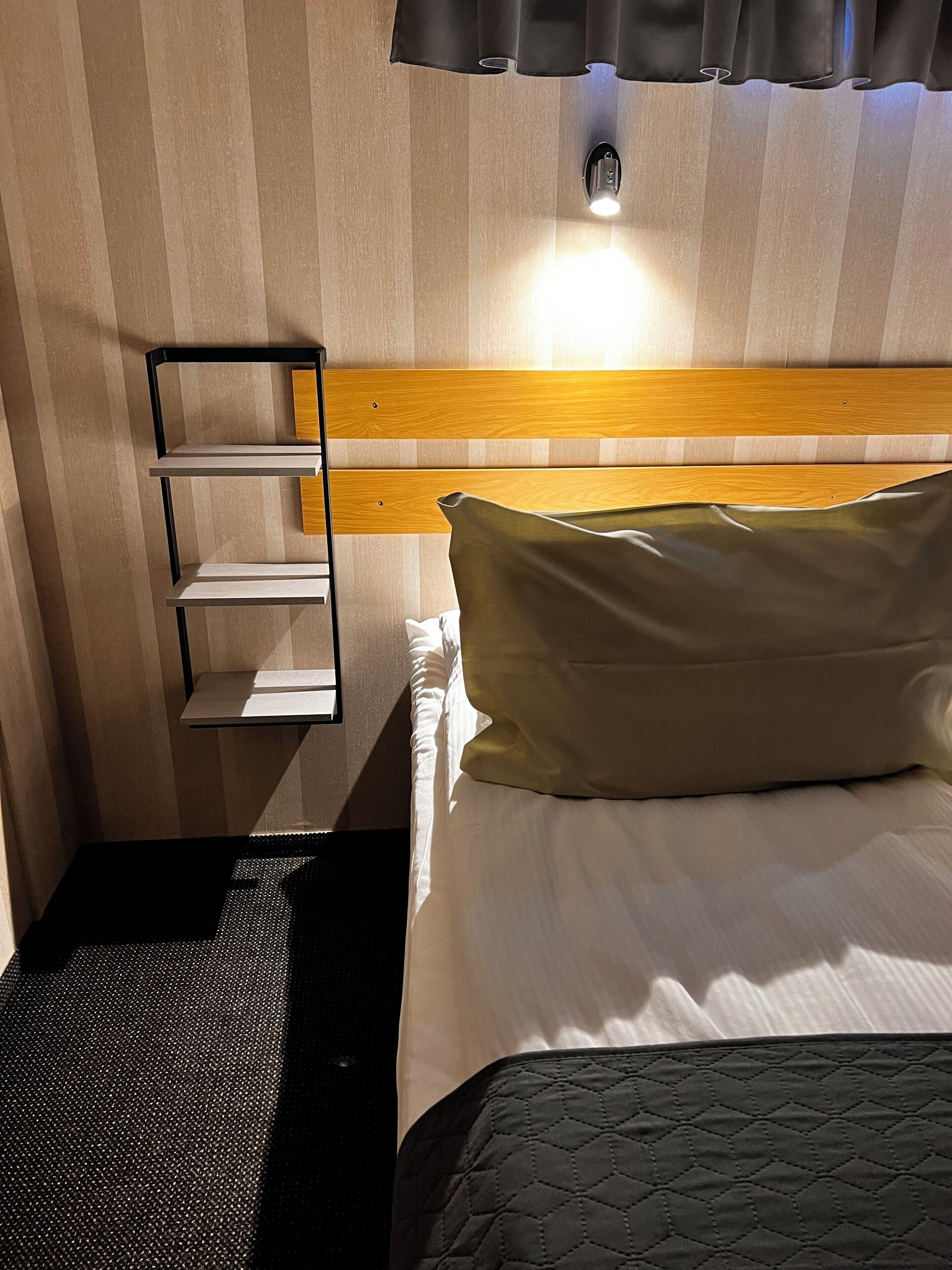 laptop workspace, blackout curtains, free wifi, bed sheets