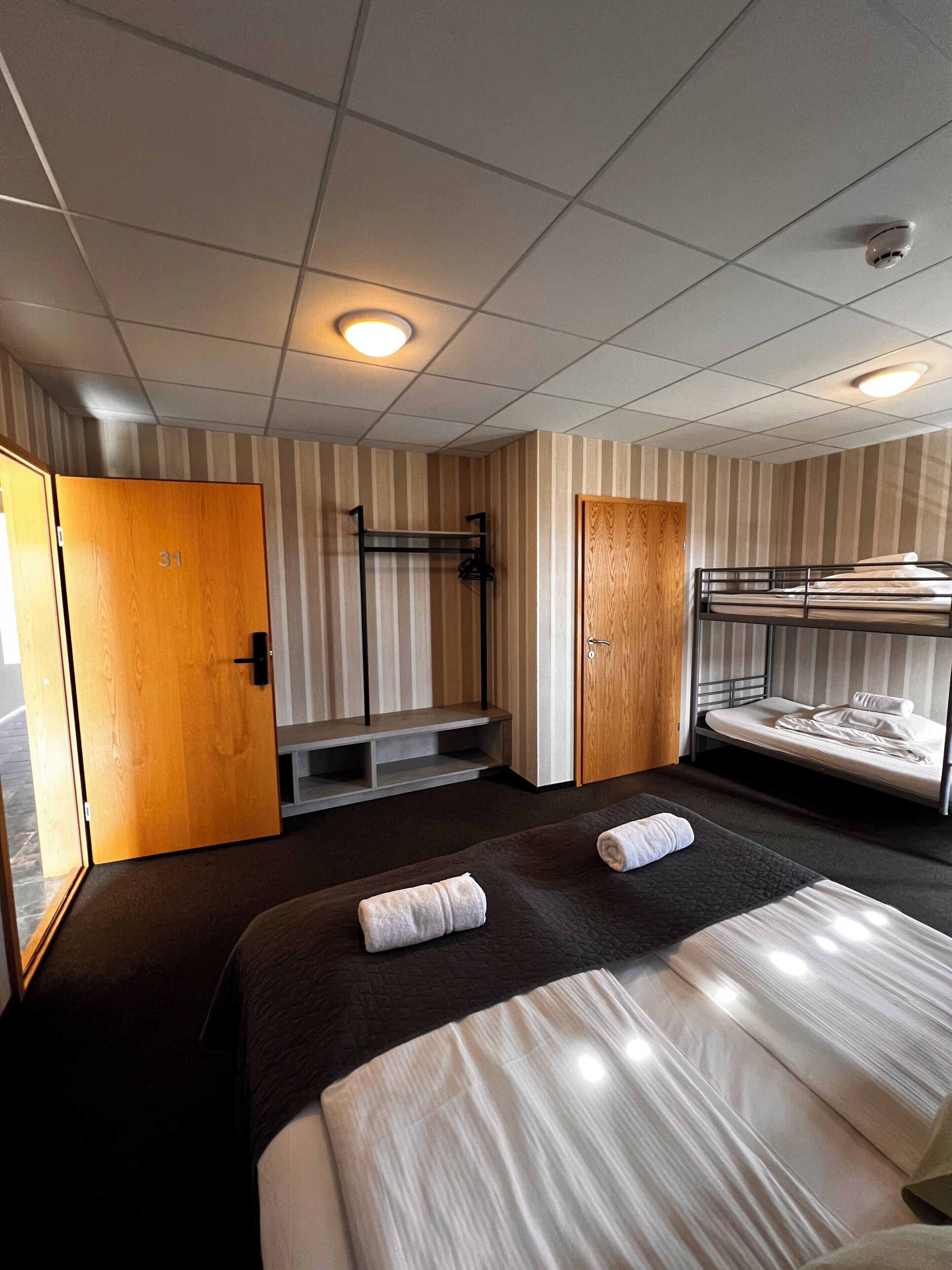 laptop workspace, blackout curtains, free wifi, bed sheets