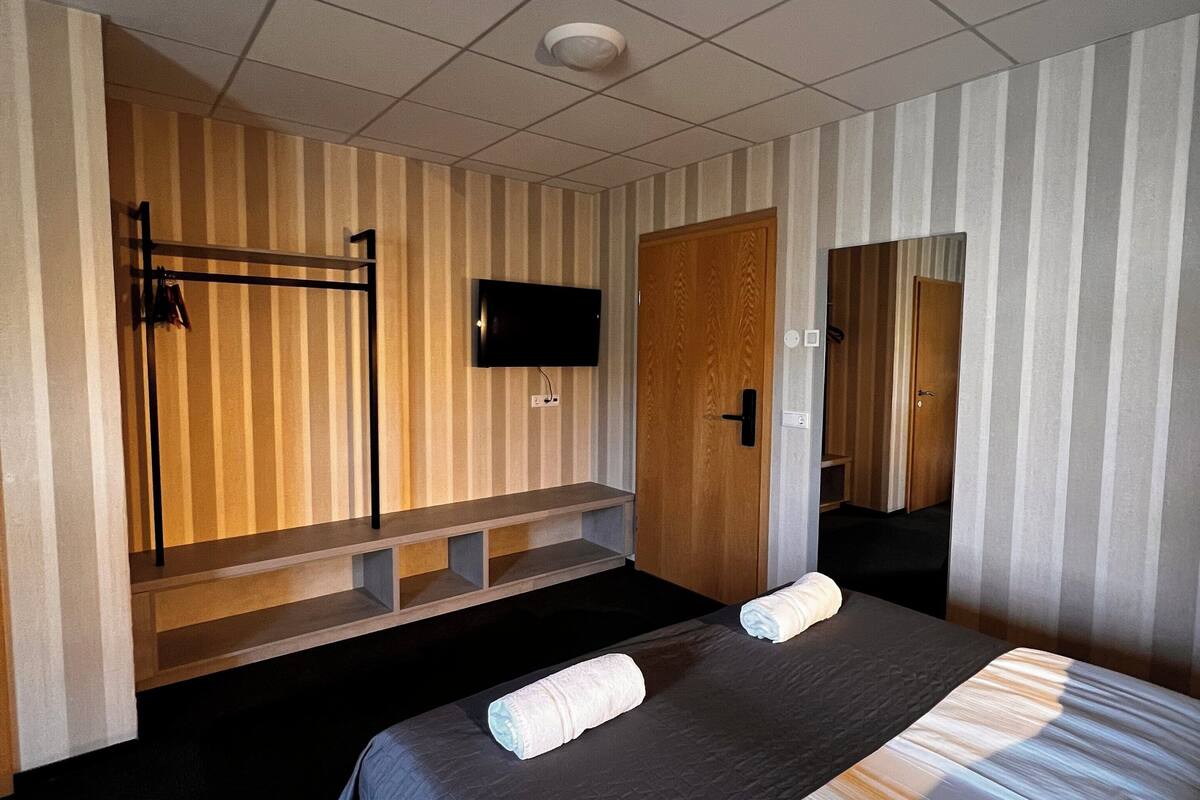 laptop workspace, blackout curtains, free wifi, bed sheets