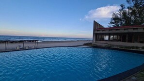 2 outdoor pools, pool umbrellas, pool loungers