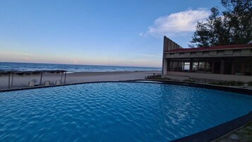 2 outdoor pools, pool umbrellas, sun loungers