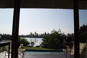 Room, 2 Queen Beds, Lagoon View | In-room safe, individually decorated, individually furnished, desk