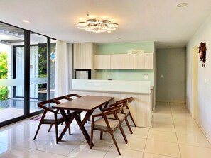 Deluxe Villa | Living area | Flat-screen TV