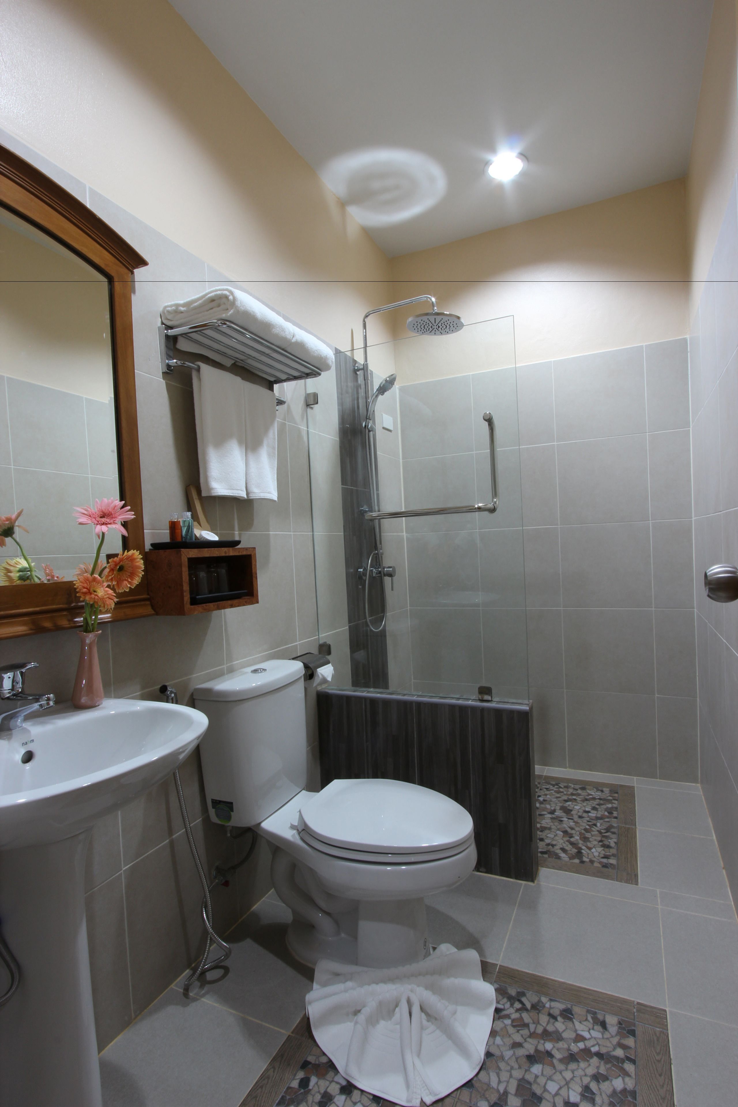 family room | bathroom | shower, free toiletries, hair dryer, towels
