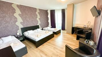 Family Room, Multiple Beds | In-room safe, desk, blackout curtains, soundproofing