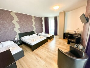Family Room, Multiple Beds | In-room safe, desk, blackout curtains, soundproofing - Hotel Modena (Bratislava)