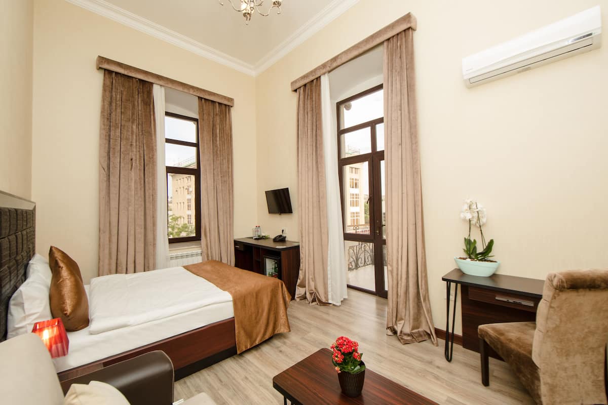 Junior Studio Suite, 1 Queen Bed with Sofa bed, Balcony | 1 bedroom, premium bedding, minibar, in-room safe