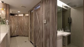 Shower, hair dryer, slippers, towels