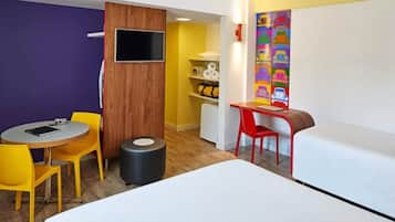 Standard Apartment, Multiple Beds | Minibar, in-room safe, desk, laptop workspace