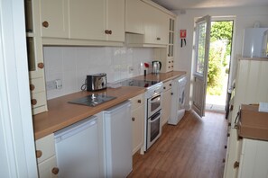 Appartamento, 4 camere da letto | Cucina privata | Frigorifero con congelatore, microonde, forno, piano cottura