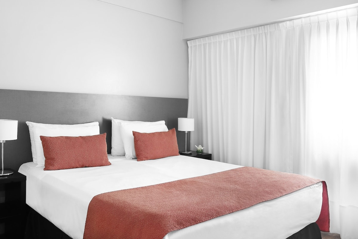 Premium bedding, down comforters, pillowtop beds, in-room safe