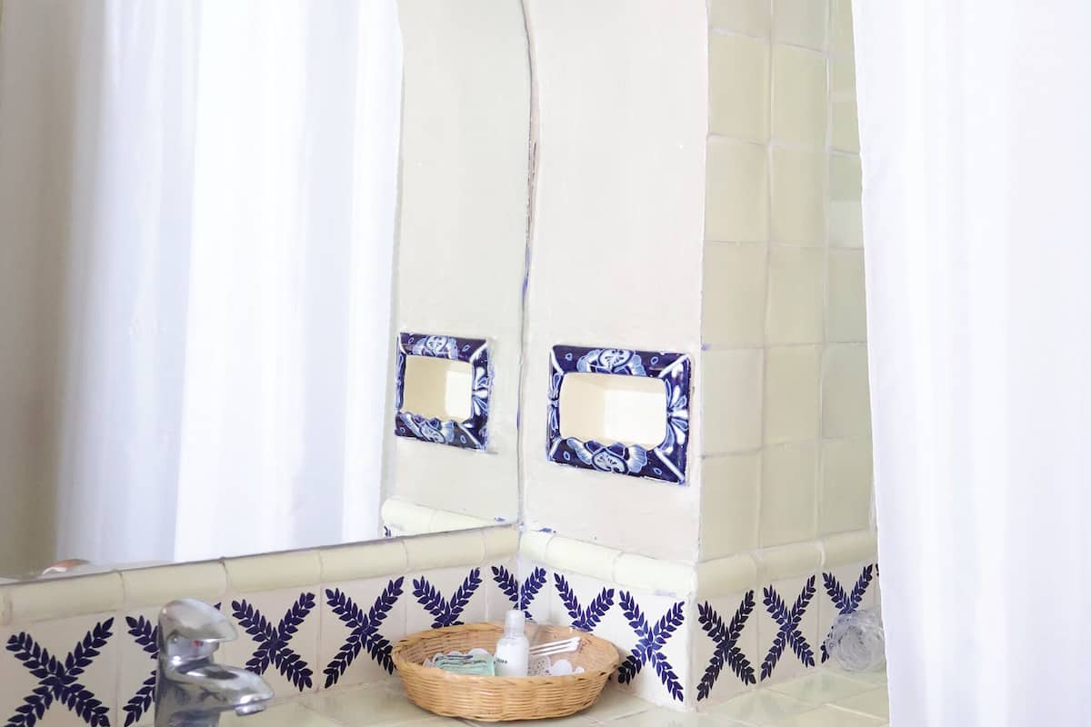 junior studio suite | bathroom | shower, free toiletries, hair dryer, towels