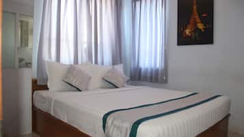 Frette Italian sheets, premium bedding, memory-foam beds, minibar