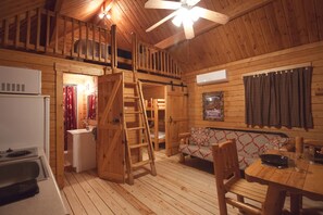 Classic Room | Living area | 42-inch TV with digital channels, DVD player, streaming services - Katie's Cozy Cabins (Tombstone)