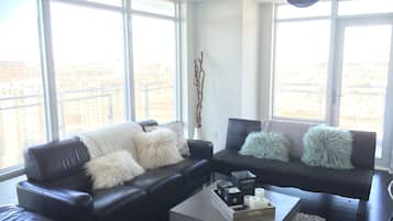 Apartment, 2 Bedrooms | Living room | Flat-screen TV