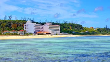 Private beach, white sand, sun loungers, beach umbrellas