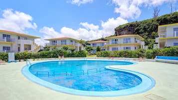 Seasonal outdoor pool, pool loungers