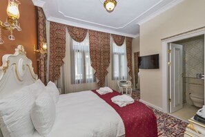 Economy kamer | Een minibar, een kluis op de kamer, een bureau