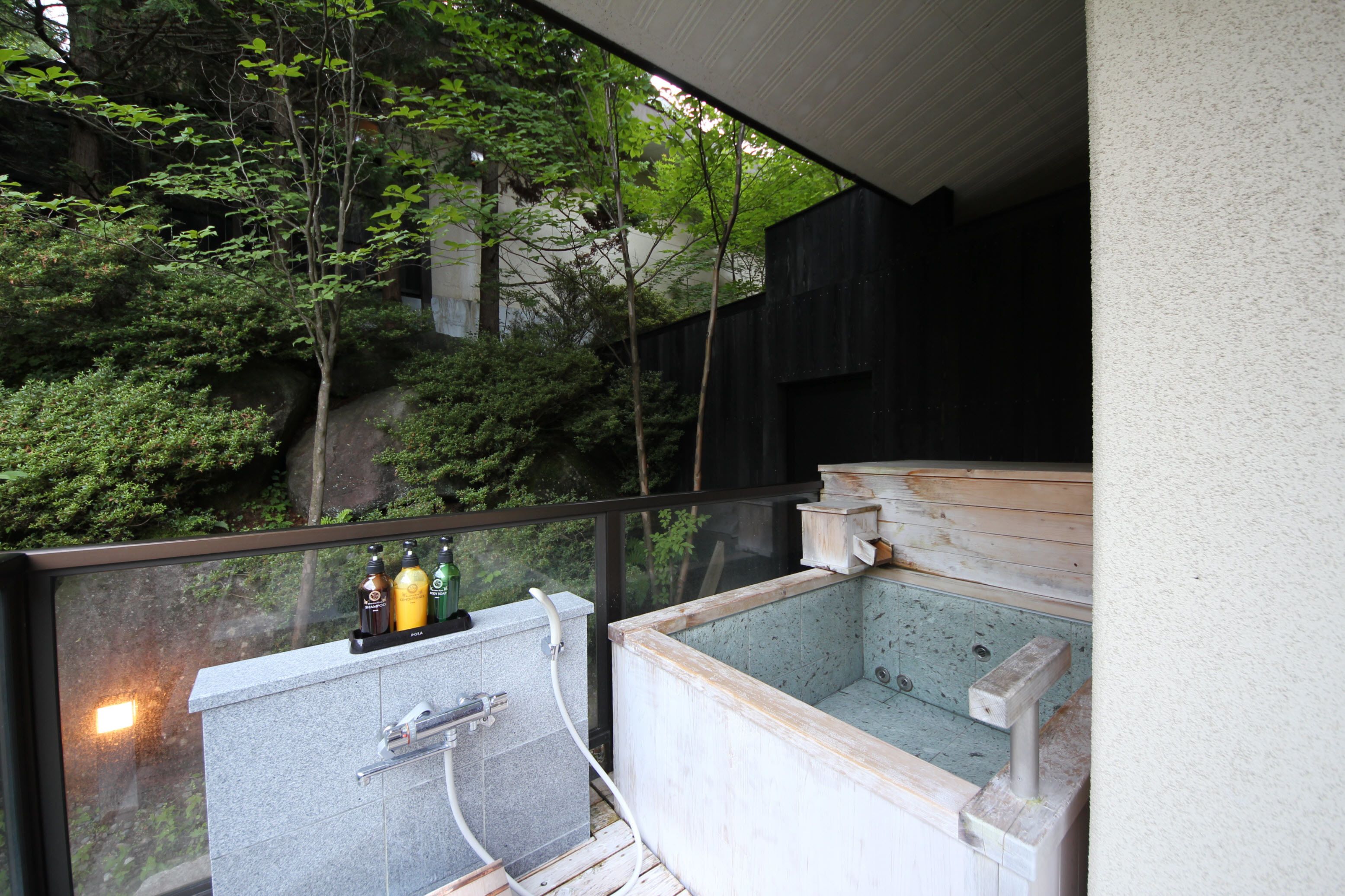 ginryu japanese twin room with open-air bath | bathroom | combined shower/bathtub, deep-soaking bathtub, rainfall showerhead