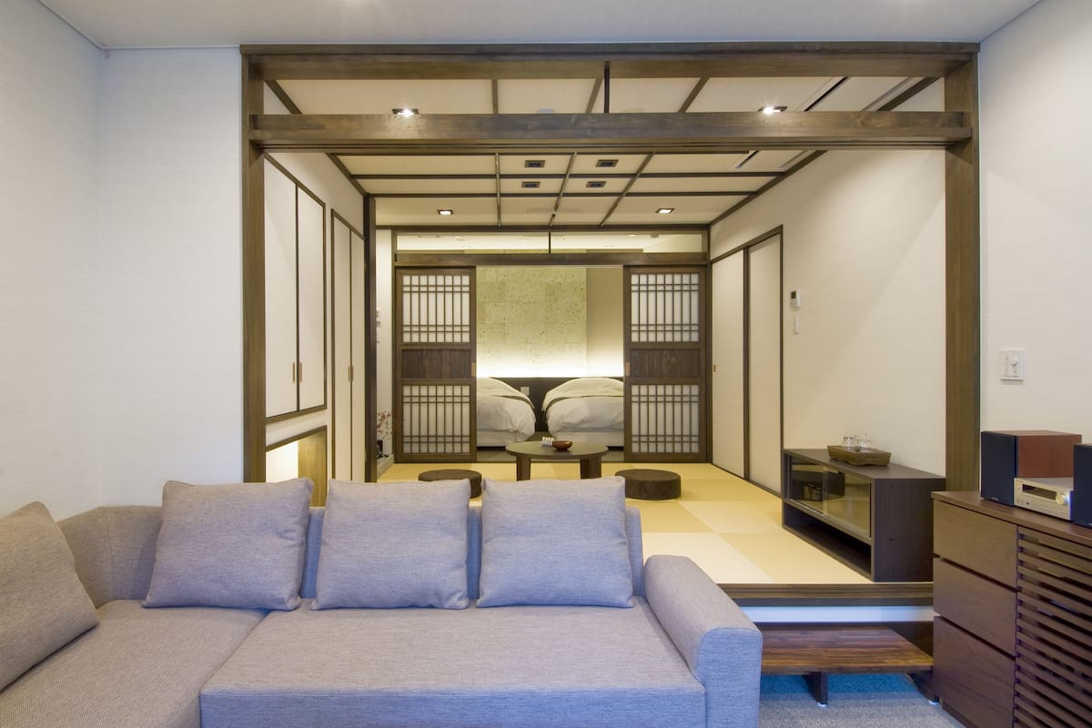 Deluxe Suite with Open-air Bath, 2 Bedrooms, Annex Building | Living area | 25-inch LED TV with digital channels, TV, MP3 dock