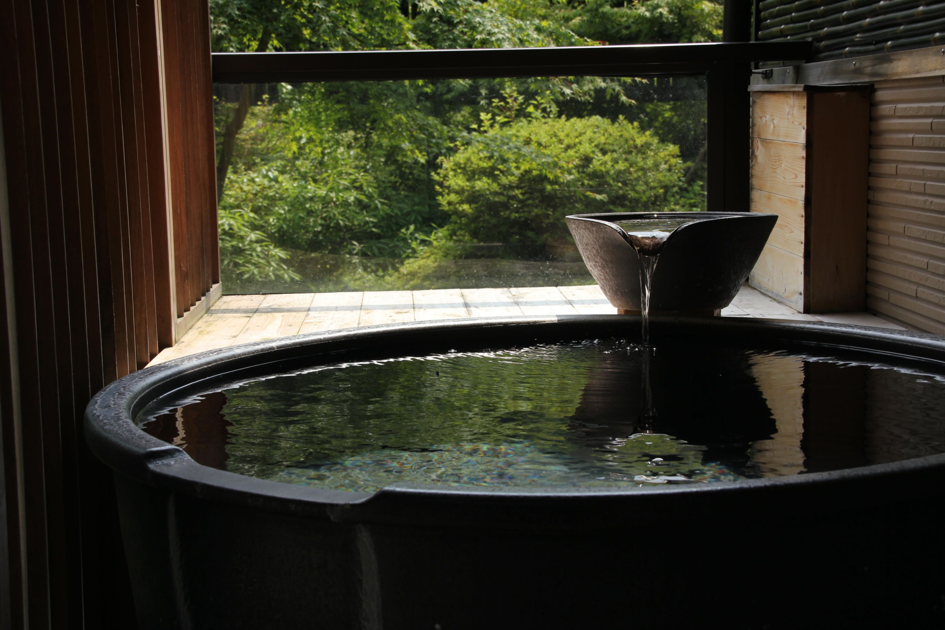 ginryu traditional japanese room with open-air bath | bathroom | combined shower/bathtub, deep-soaking bathtub, rainfall showerhead