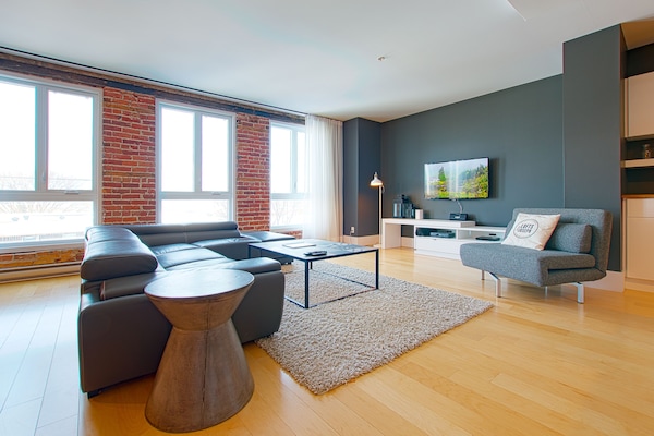 Two-Bedrooms Family Apartment + Bunk bed - City View (303) | Living area | 40-inch flat-screen TV with cable channels, TV