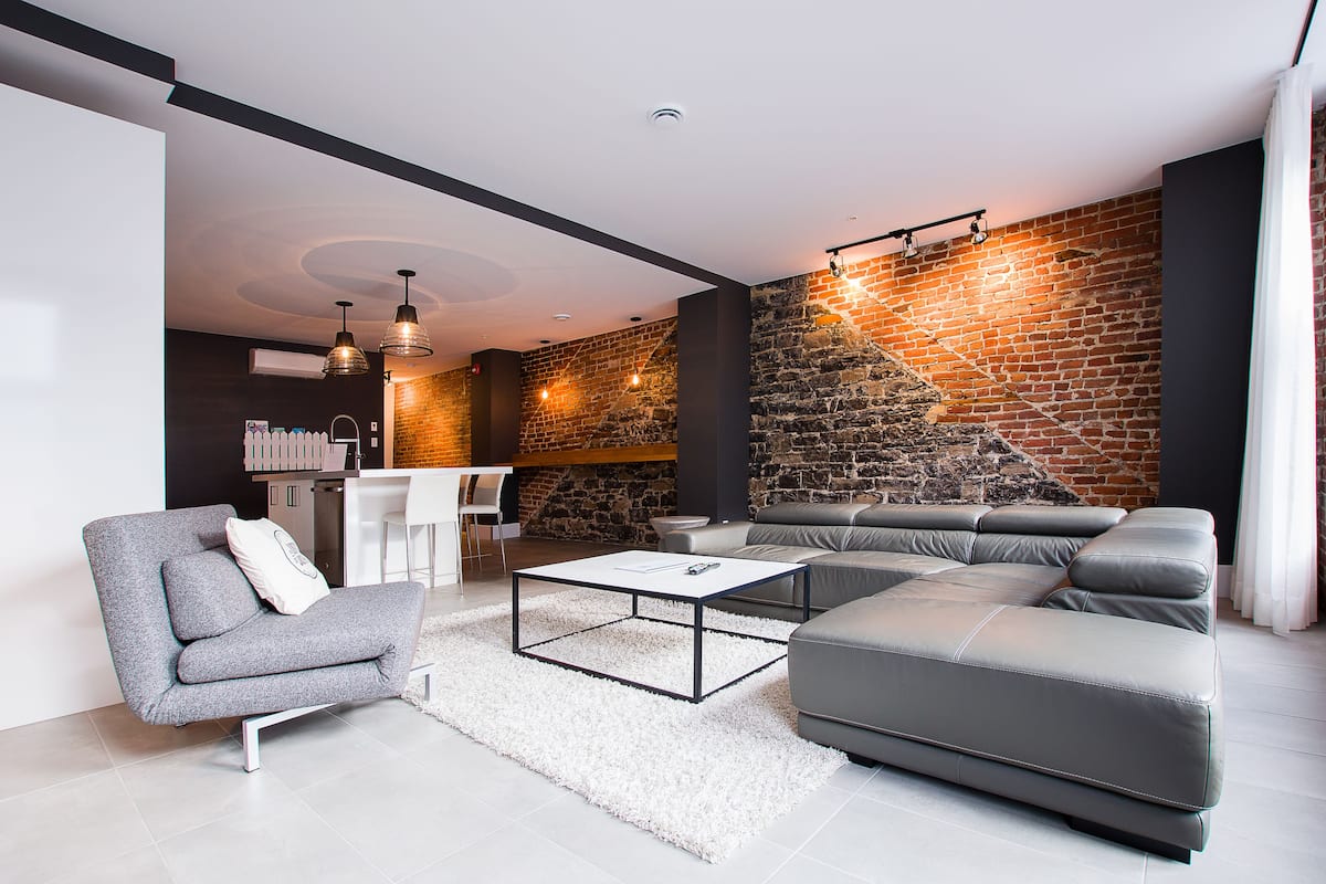 Loft, 2 habitaciones (202) | Área de sala de estar | Televisión de pantalla plana de 40 pulgadas con canales por cable