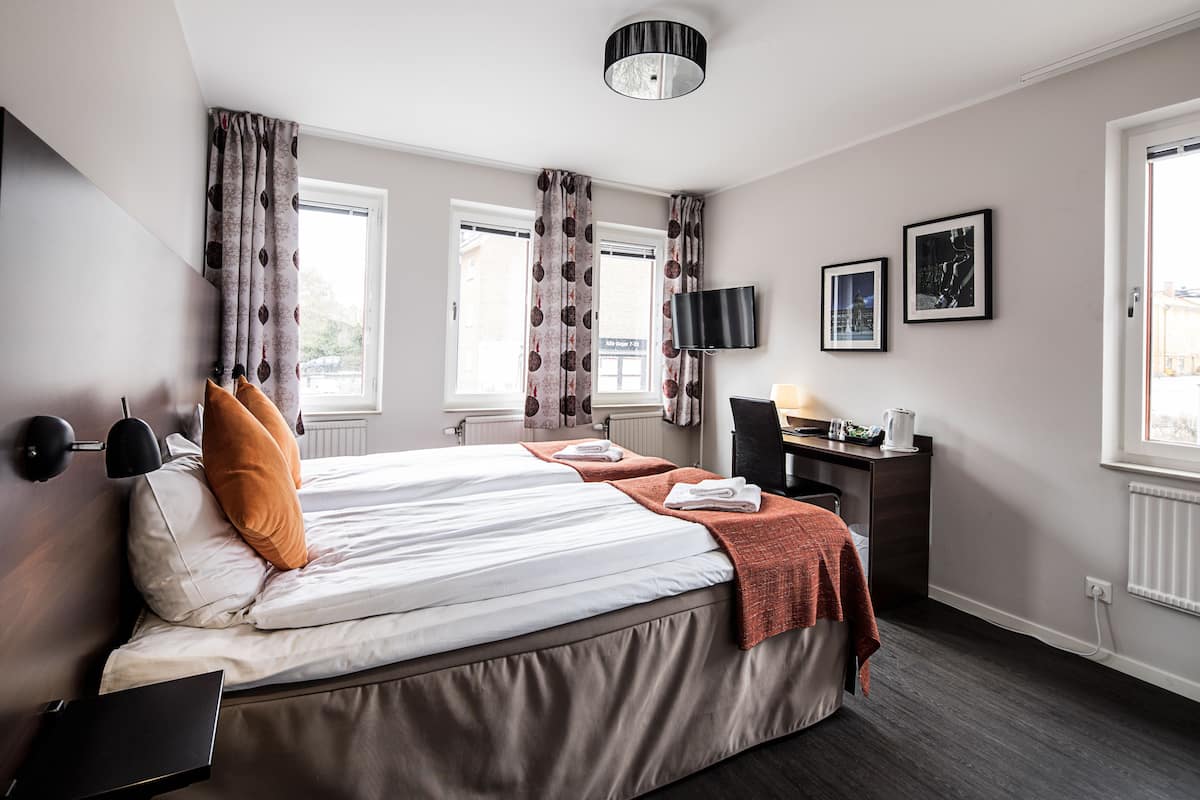 Blackout curtains, iron/ironing board (on request), free WiFi